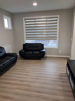 Photo 2: 93 Herron Mews NE in Calgary: Livingston Semi Detached (Half Duplex) for sale : MLS®# A2105630