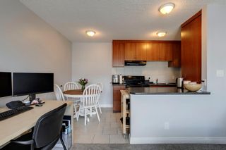 Photo 7: 402 1710 11 Avenue SW in Calgary: Sunalta Apartment for sale : MLS®# A1231988