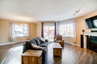 Photo 8: 205 5489 201 Street in Langley: Langley City Condo for sale in "CANIM COURT" : MLS®# R2516113