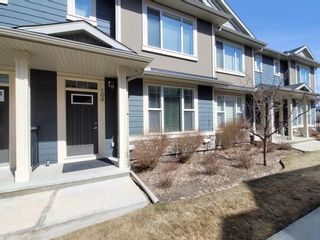Photo 2: 106 Panatella Walk NW in Calgary: Panorama Hills Row/Townhouse for sale : MLS®# A1206869
