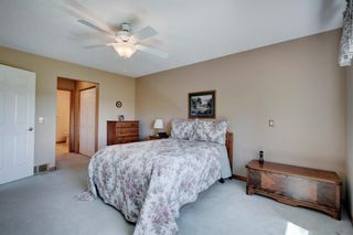 Photo 14: 65 Strathearn Gardens SW in Calgary: Strathcona Park Semi Detached for sale : MLS®# A1240835