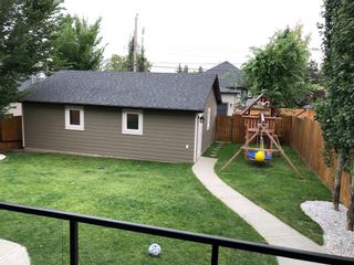 Photo 6: 2031 52 Avenue SW in Calgary: North Glenmore Park Detached for sale : MLS®# A1059510