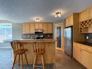 Photo 4: 54 Springborough Point SW in Calgary: Springbank Hill Detached for sale : MLS®# A1227826