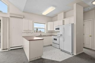 Photo 9: 305 6900 Hunterview Drive NW in Calgary: Huntington Hills Apartment for sale : MLS®# A1193201