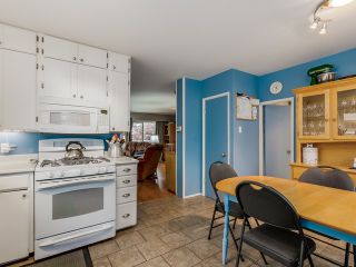 Photo 8: 4656 RAVINE Street in Vancouver: Collingwood VE House for sale (Vancouver East)  : MLS®# R2107811