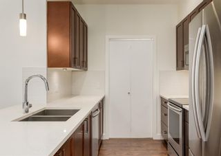 Photo 3: 307 22 Auburn Bay Link SE in Calgary: Auburn Bay Apartment for sale : MLS®# A1165962