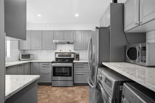 Photo 1: 28 10751 MORTFIELD Road in Richmond: South Arm Townhouse for sale in "CHELSEA PLACE" : MLS®# R2588040