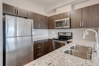 Photo 3: 210 200 Cranfield Common SE in Calgary: Cranston Apartment for sale : MLS®# A1094914