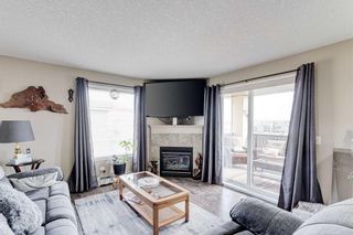 Photo 1: 8429 304 Mackenzie Way SW: Airdrie Apartment for sale : MLS®# A2125432