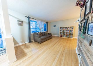 Photo 4: 2435 52 Avenue SW in Calgary: North Glenmore Park Detached for sale : MLS®# A2029856