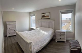 Photo 12: 1883 Na'a Drive SW in Calgary: Medicine Hill Row/Townhouse for sale : MLS®# A2137152