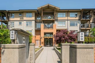 Photo 1: 310 300 KLAHANIE Drive in Port Moody: Port Moody Centre Condo for sale in "TIDES" : MLS®# R2779830