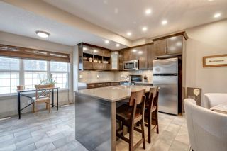 Photo 10: 119 Couture Crescent SW in Calgary: Garrison Green Row/Townhouse for sale : MLS®# A1197042