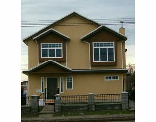 Photo 1: 7449 Main Street in Vancouver: South Vancouver 1/2 Duplex for sale (Vancouver East)  : MLS®# V622304