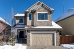 Main Photo: 94 West Coach Way SW in Calgary: West Springs Detached for sale : MLS®# A2107559