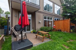 Photo 1: 35 40750 TANTALUS Road in Squamish: Tantalus Townhouse for sale in "MEIGHAN CREEK ESTATES" : MLS®# R2713573