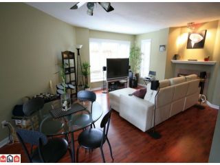 Photo 2: 106 9978 148TH Street in Surrey: Guildford Condo for sale in "Highpoint Gardens" (North Surrey)  : MLS®# F1008388