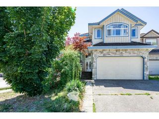 Photo 1: 8051 146A Street in Surrey: Bear Creek Green Timbers House for sale : MLS®# R2286679