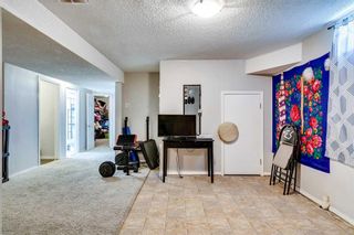 Photo 12: 8 Woodborough Crescent SW in Calgary: Woodbine Detached for sale : MLS®# A2105085