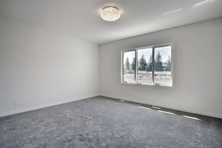 Photo 24: 433 Shawnee Boulevard SW in Calgary: Shawnee Slopes Detached for sale : MLS®# A1098238