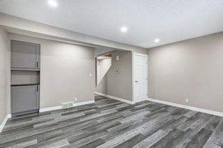 Photo 7: 4403 Bow Trail SW in Calgary: Rosscarrock Row/Townhouse for sale : MLS®# A2022311