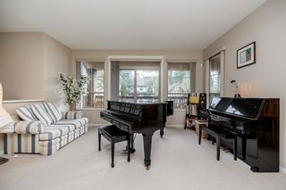 Photo 2: 521 FOREST PARK Way in Port Moody: Heritage Woods PM House for sale : MLS®# R2846120