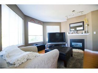 Photo 3: 306 5759 GLOVER Road in Langley: Langley City Condo for sale in "College Court" : MLS®# F1430779