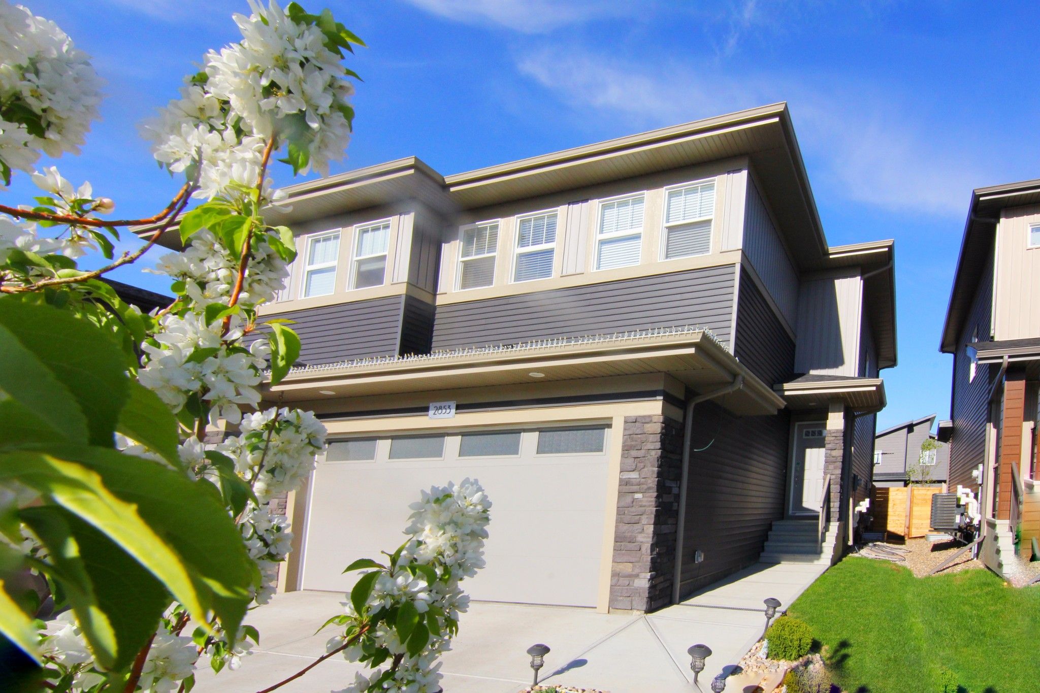 Main Photo: 2853 KOSHAL Crescent in Edmonton: House Half Duplex for sale