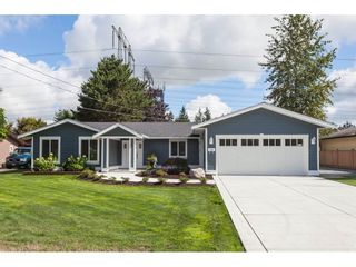 Photo 3: 20561 43A Avenue in Langley: Brookswood Langley House for sale : MLS®# R2511478
