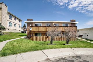 Photo 4: 223 HUNTINGTON PARK Bay NW in Calgary: Huntington Hills 4 plex for sale : MLS®# C4296594