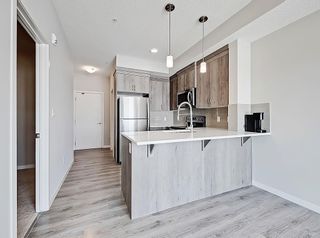 Photo 3: 207 20 Seton Park SE in Calgary: Seton Apartment for sale : MLS®# A2029984
