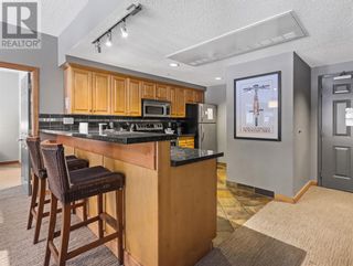 Photo 1: 188, 91B Three Sisters Drive in Canmore: Condo for sale : MLS®# A2037499