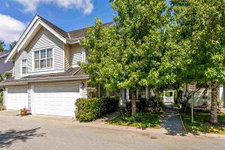 Photo 1: 29 17097 64 Avenue in Surrey: Cloverdale BC Townhouse for sale in "Kentucky" (Cloverdale)  : MLS®# R2485562