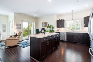 Photo 13: 411 20281 53A Avenue in Langley: Langley City Condo for sale in "Gibbons Layne" : MLS®# R2621680
