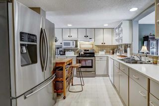 Photo 11: 20 5810 Patina Drive SW in Calgary: Patterson Row/Townhouse for sale : MLS®# A2124736