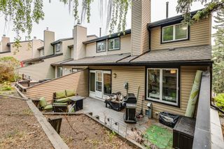 Photo 9: 5 448 Strathcona Drive SW in Calgary: Strathcona Park Row/Townhouse for sale : MLS®# A2049725