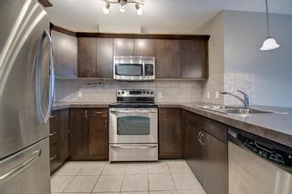 Photo 5: 1207 4 Kingsland Close SE: Airdrie Apartment for sale : MLS®# A1062903
