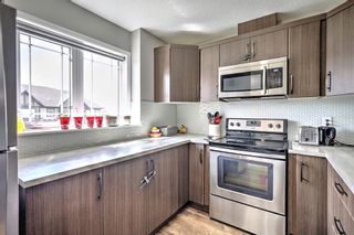 Photo 10: 114 Hillcrest Gardens SW: Airdrie Row/Townhouse for sale : MLS®# A1215843