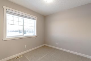 Photo 24: 559 Panamount Boulevard NW in Calgary: Panorama Hills Semi Detached (Half Duplex) for sale : MLS®# A2013947