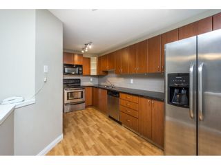 Photo 7: 105 3063 IMMEL Street in Abbotsford: Central Abbotsford Condo for sale in "Clayburn Ridge" : MLS®# R2125465