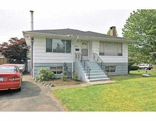 Photo 2: 1402 COMO LAKE AV in Coquitlam: Central Coquitlam House for sale : MLS®# V536066