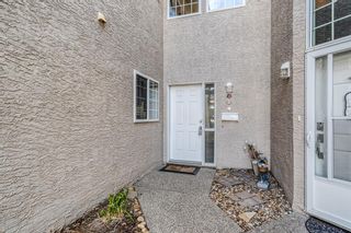 Photo 3: 104 1997 Sirocco Drive SW in Calgary: Signal Hill Row/Townhouse for sale : MLS®# A1206113
