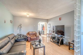 Photo 5: 11744 Canfield Road SW in Calgary: Canyon Meadows Semi Detached for sale : MLS®# A1180391