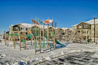 Photo 26: 104 Redstone View NE in Calgary: Redstone Row/Townhouse for sale : MLS®# A2027443