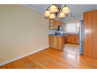 Photo 5: 6415 LONGMOOR Way SW in Calgary: Lakeview House for sale : MLS®# C4102401