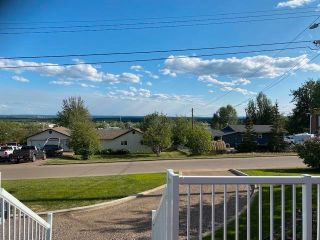 Photo 3: 5408 W 53 Avenue in Fort Nelson: Fort Nelson -Town House for sale : MLS®# R2784882