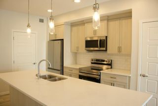 Photo 4: 311 80 Carrington Plaza NW in Calgary: Carrington Apartment for sale : MLS®# A2119837