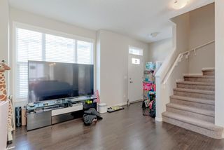 Photo 7: 107 Panatella Walk NW in Calgary: Panorama Hills Row/Townhouse for sale : MLS®# A1190534