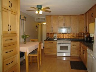 Photo 4: 22 3031 200 Street in Langley: Brookswood Langley Manufactured Home for sale in "Cedar Creek" : MLS®# F1440916