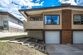Photo 1: 5840 Dalgleish Road NW in Calgary: Dalhousie Semi Detached (Half Duplex) for sale : MLS®# A1244828